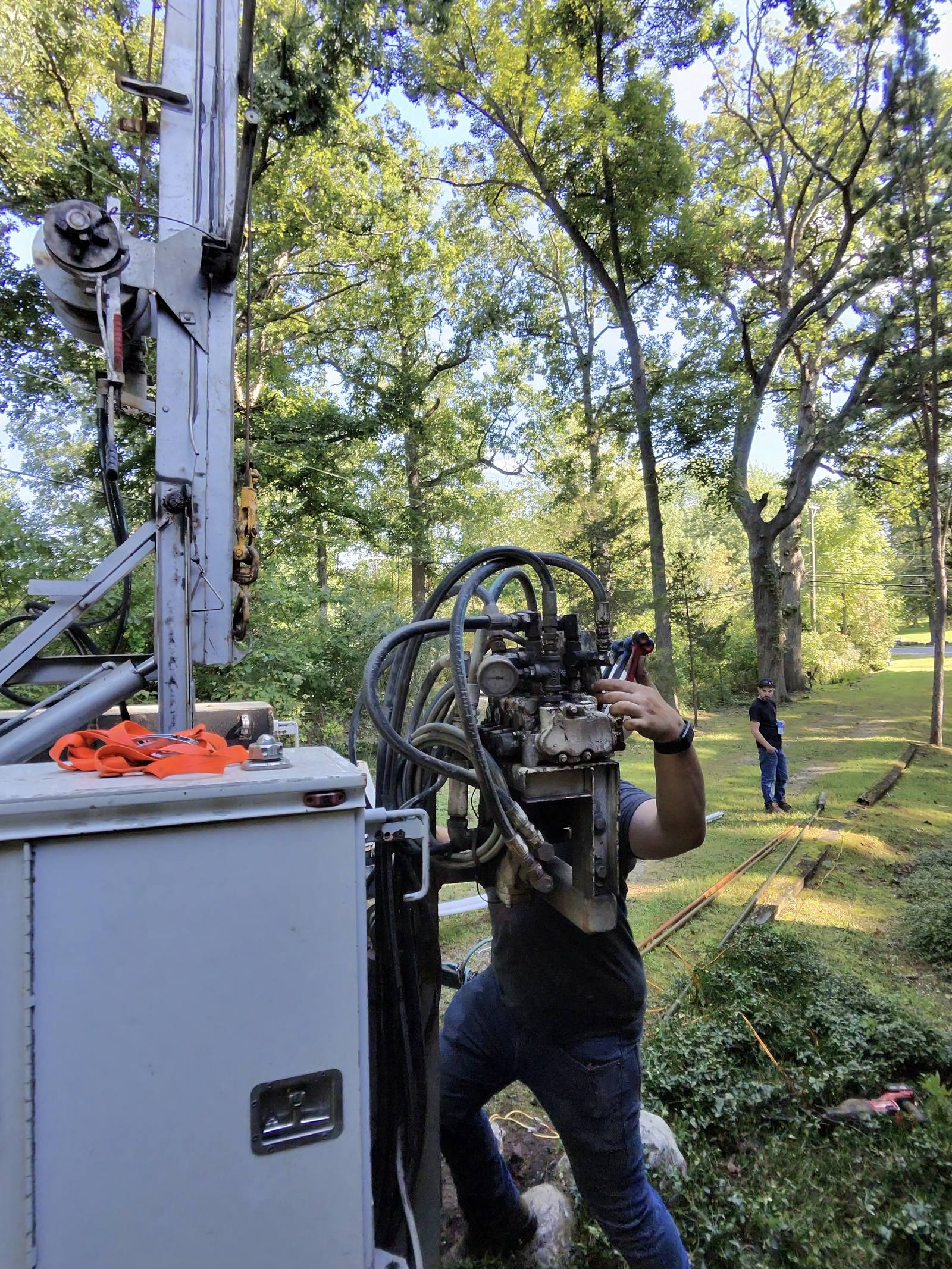 Maglothin Well and Water Treatment pump hoist truck on a well service job in Oakland County, MI