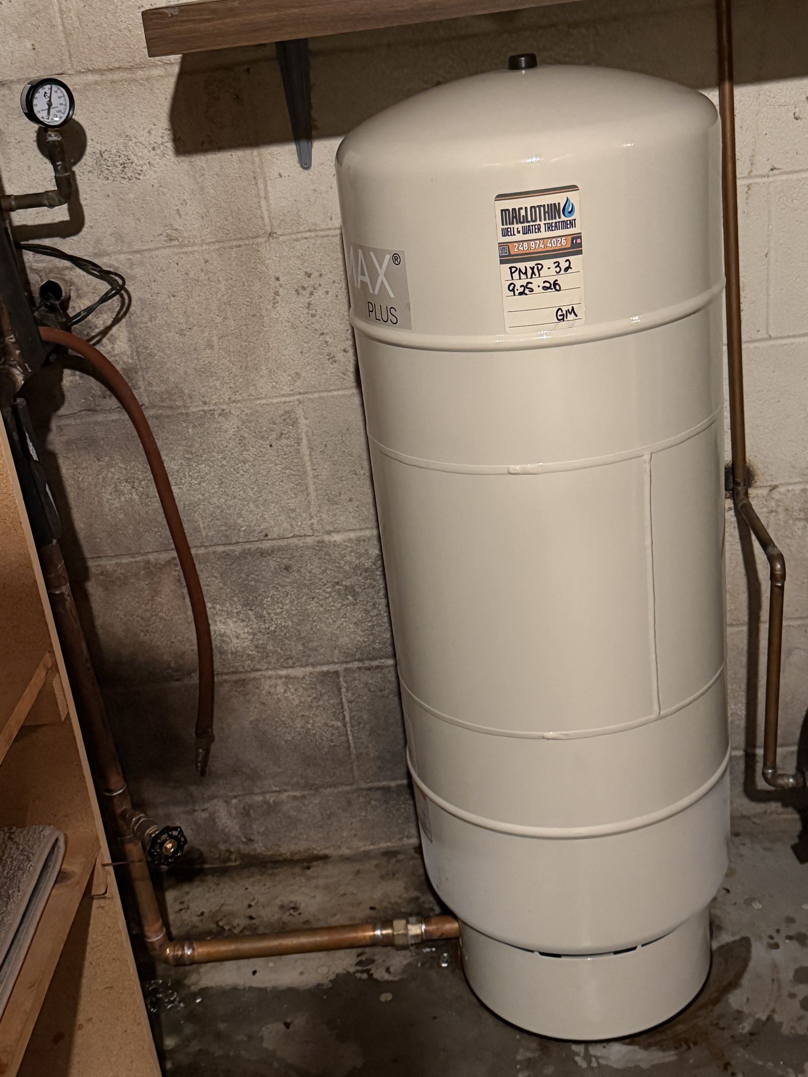 New well pressure tank, labeled and dated, installed in Commerce Township, MI