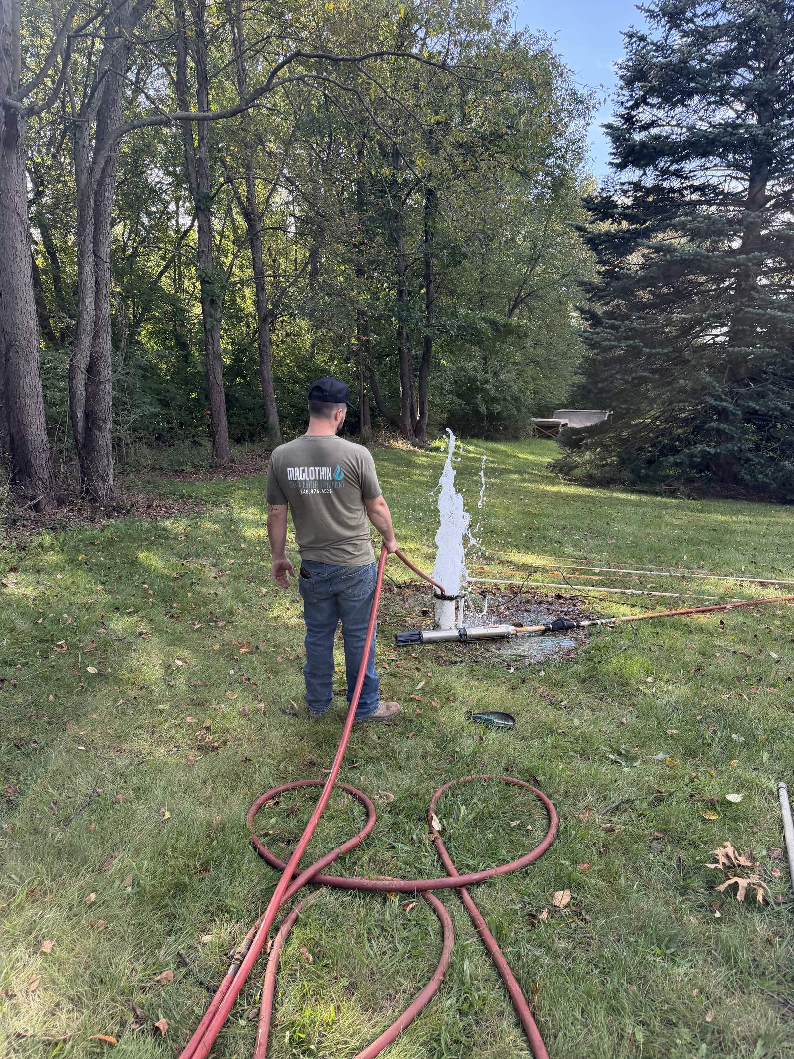 Well cleanout in Lake Orion, MI – blowing sediment out of the well after pulling the pump